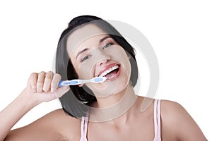 Woman with great teeth holding tooth-brush