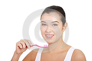 Woman with great teeth holding tooth-brush