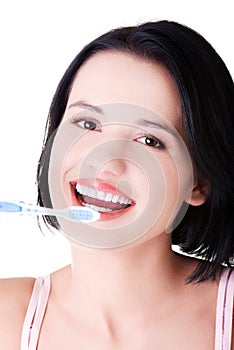 Woman with great teeth holding tooth-brush