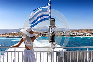 Woman on a Greek ferry boat traveling through the cyclades