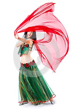 A woman in a green dress Oriental dancer dancing erotic dancer