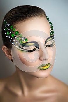 Woman with green make up