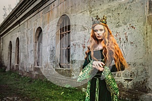 Woman in green medieval dress