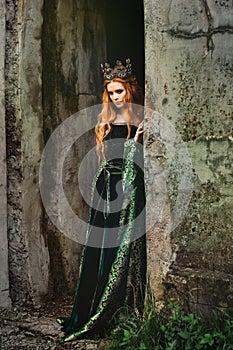 Woman in green medieval dress