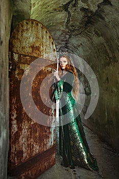 Woman in green medieval dress