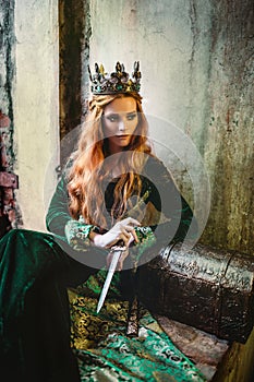 Woman in green medieval dress