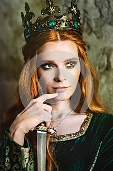 Woman in green medieval dress