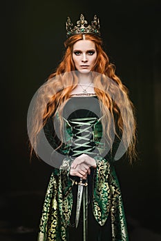 Woman in green medieval dress