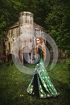 Woman in green medieval dress