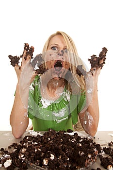 Woman green shirt with cake all over