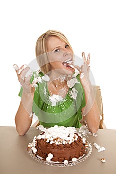 Woman green shirtt with cake lick cream