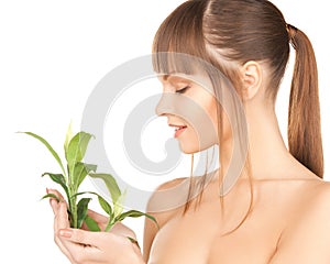 Woman with green sprout