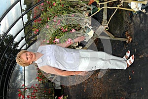 Woman in greenhouse