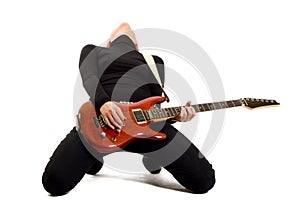 Woman guitarist playing her guitar