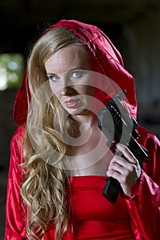 Woman with gun in coat