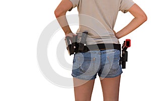 Woman with a gun on her waistband isolated