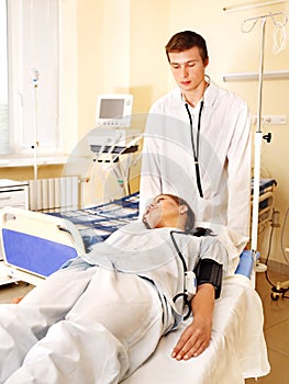 Woman on gurney in operating room.