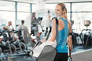 Woman with gym bag photo