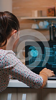 Woman hacker coding html and programming on screen laptop