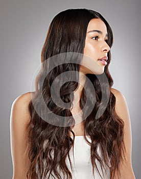 Woman with hair, beauty with balayage and curly hairstyle with haircare and keratin treatment on studio background