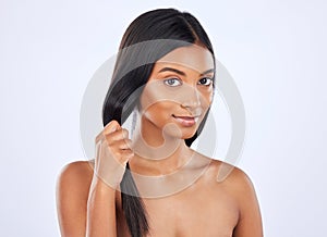 Woman, hair and beauty and haircare, cosmetics and keratin treatment in portrait on studio background. Indian female