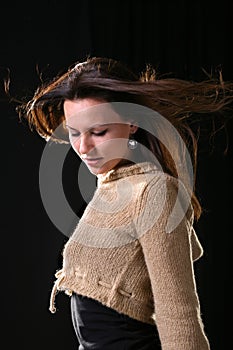 Woman hair quivering on wind portrait