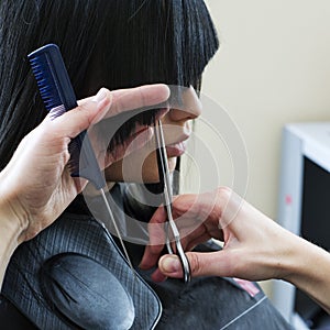 Woman in hairdressing salon photo