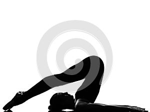Woman halasana Shoulder Stand yoga photo