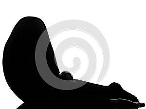 Woman halasana Shoulder Stand yoga pose photo
