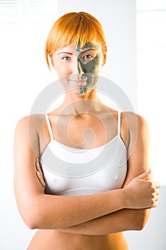 Woman in half facial mask