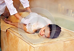 Woman in hammam or turkish bath