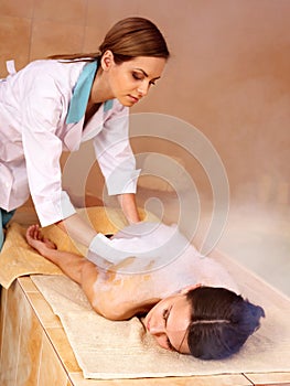 Woman in hammam or turkish bath