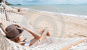 Woman on hammock. Lifestyle concept. Summer vacation. Nature concept. Summer tourism, travel.