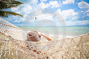 Woman on hammock. Lifestyle concept. Summer vacation. Nature concept. Summer tourism, travel.