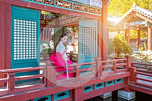 Woman with Hanbok in Gyeongbokgung,the traditional Korean dress.