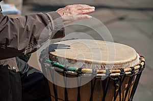 woman hand on african drums in outdoor