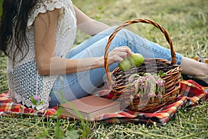 Woman hand apple and basket