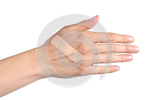 Woman hand with a band aid