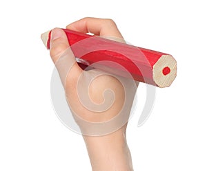 Woman hand with big red wooden pencil