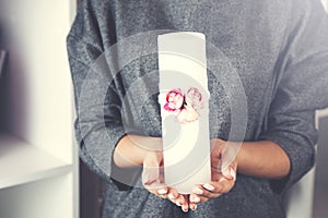 Woman hand candle
