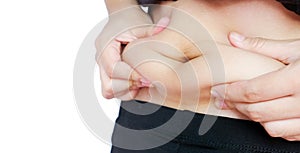 Woman hand catching fat body belly paunch isolated on white back