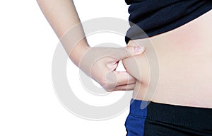 Woman hand catching fat body belly paunch isolated on white back
