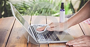 Woman Hand Cleaning Laptop  At Home