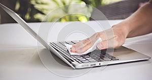 Woman Hand Cleaning Laptop  At Home