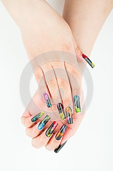 Woman hand close-up with beautiful manicure on white background