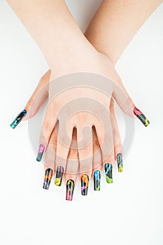 Woman hand close-up with beautiful manicure on white background