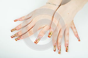 Woman hand close-up with beautiful manicure on white background