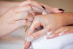 Woman Hand Cream. Close up of hands with cream or therapeutic salve