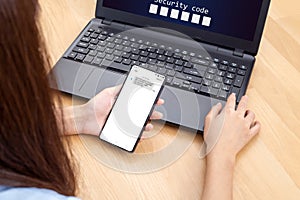Woman hand enter a one time password for the validation process, Mobile OTP secure Verification Method, 2-Step authentication web