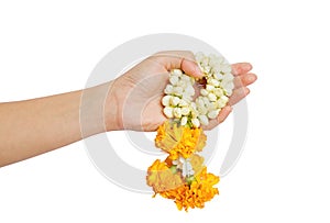 Woman hand give a thai jasmine garland